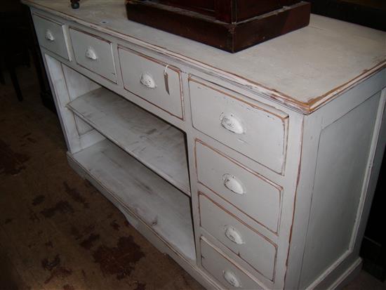 Cream-painted pine buffet fitted drawers and open shelves